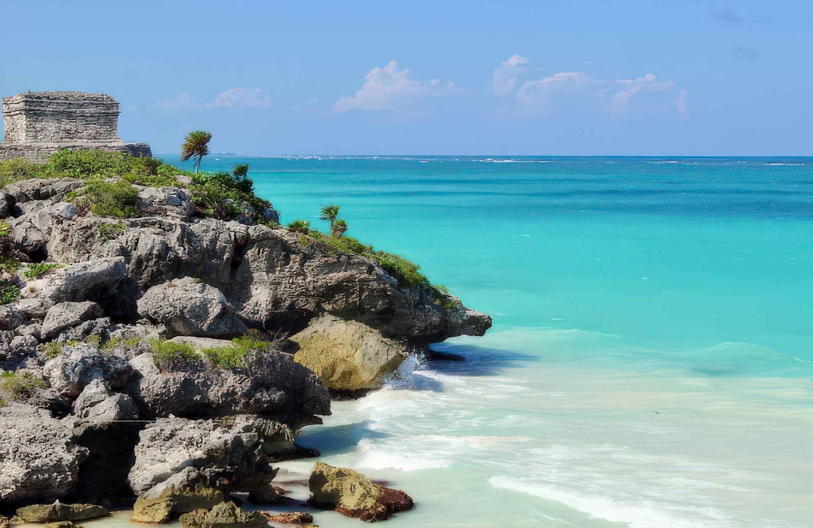 The Mayan Site of Tulum framed with the turqouise waters of the Mexican Caribbean.