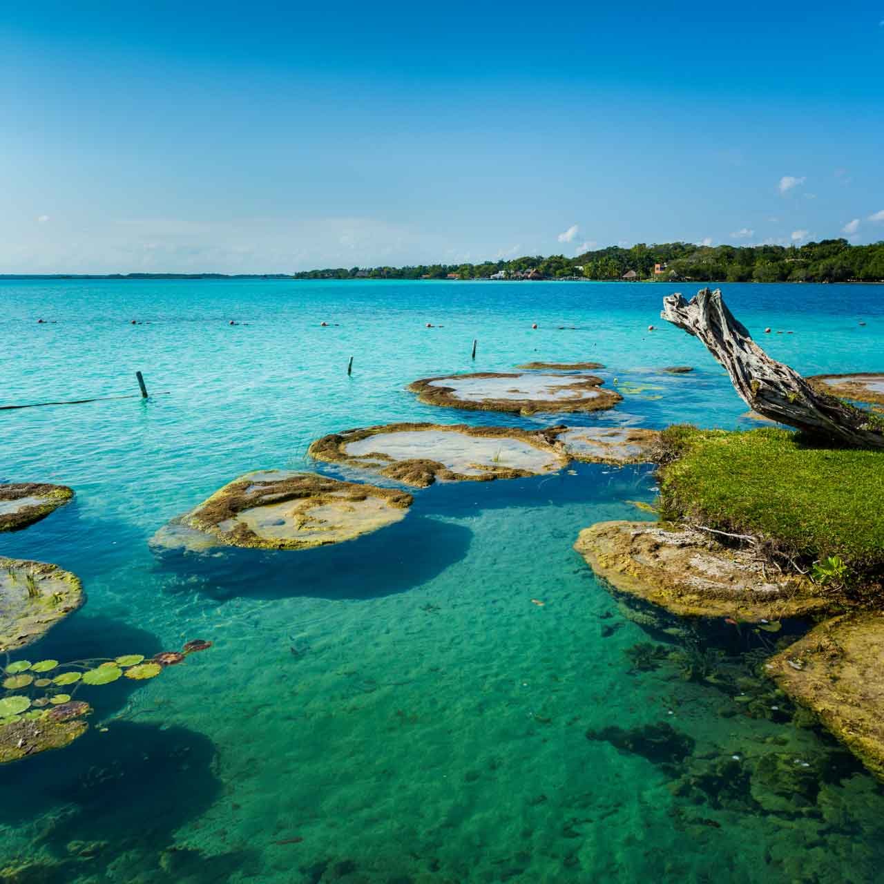 Bacalar Lagoon’s clear turquoise waters, part of private Quintana Roo journeys through southern Mexico